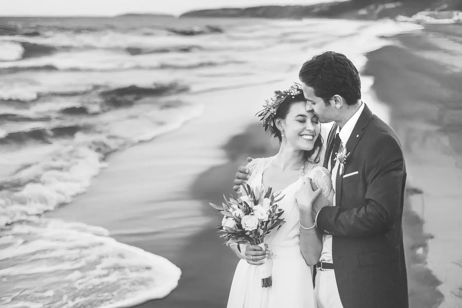 a man and woman on a beach