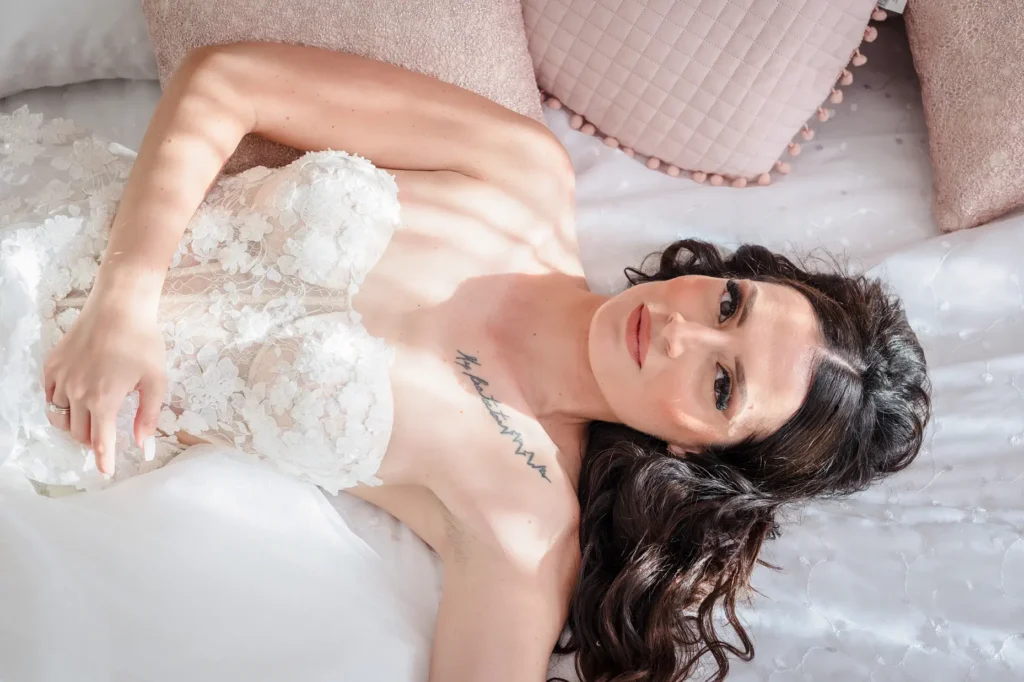 a woman lying on a bed