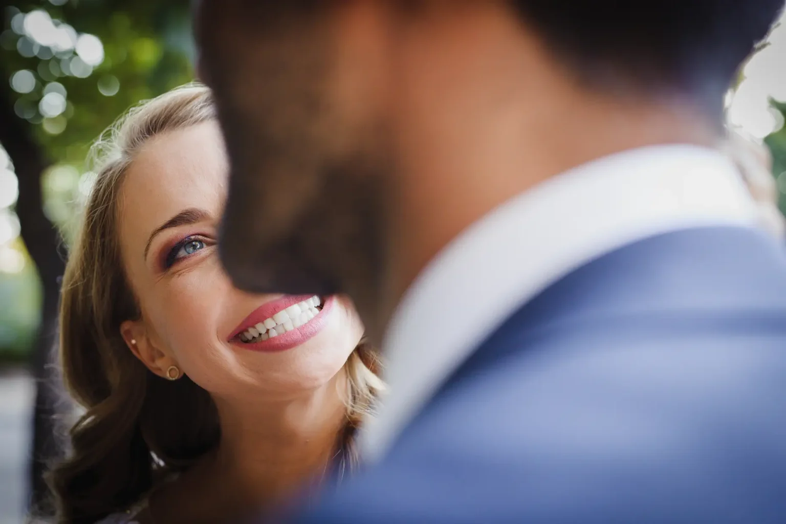 a man and woman smiling